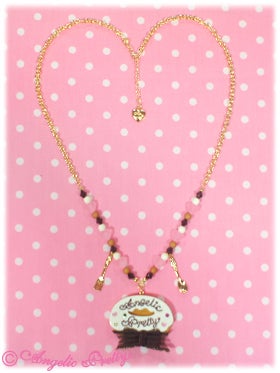 Melty Cream Doughnut Necklace by Angelic Pretty