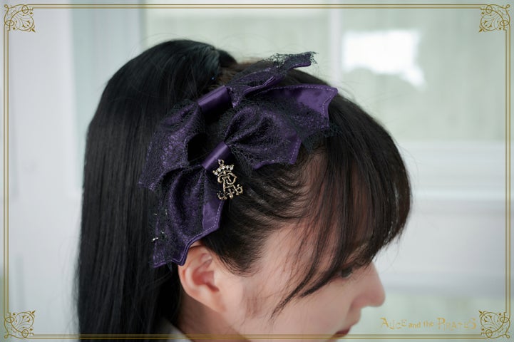 Devil Wing Ribbon Clip (2022) by Alice and the Pirates