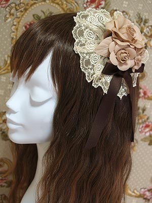 Rosette Headdress (2007) by Mary Magdalene