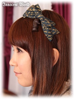 Chocolate Chess Head Bow by Innocent World