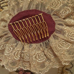Rosette Headdress (2010) by Mary Magdalene