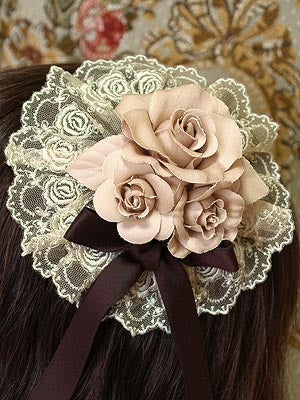 Rosette Headdress (2010) by Mary Magdalene